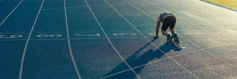 Spray Coating Running Track - Avind Sports Flooring Systems